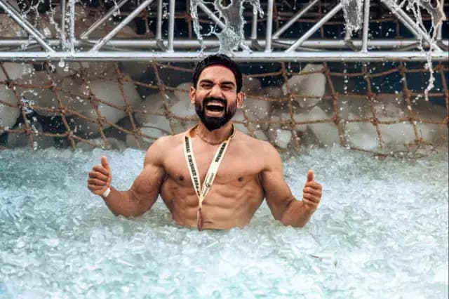 Participant celebrating in water splash